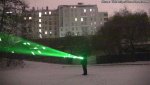 Green-laser-beam-in-falling-snow.jpg