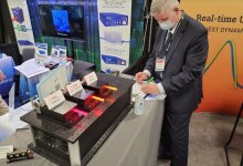 607 610 639nm lasers in booth small.JPG